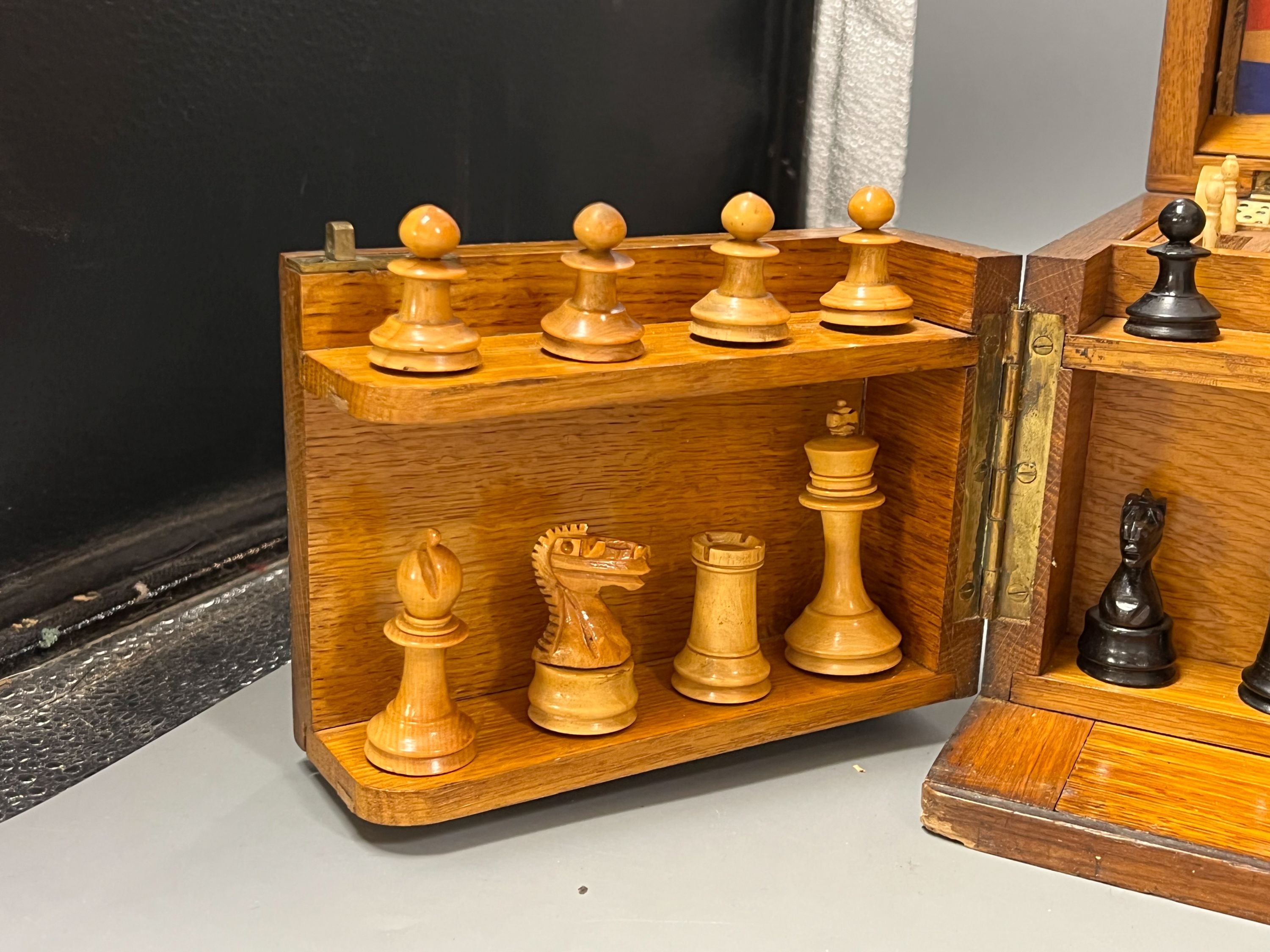 A Victorian oak games compendium, 32cm wide